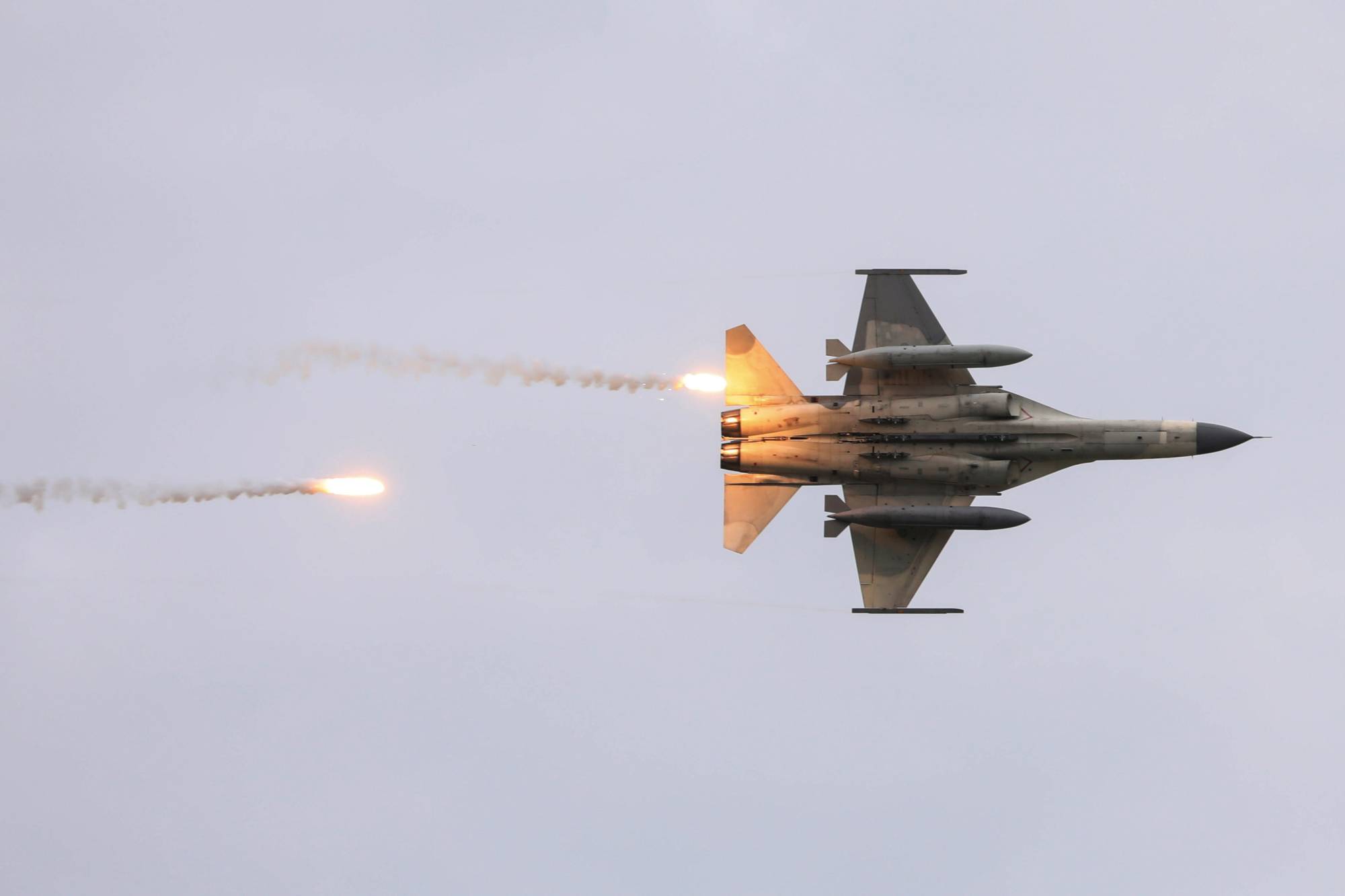 Taiwanese fighters take part in a live-fire drill simulating an enemy invasion, in Taichung, Taiwan. | REUTERS 