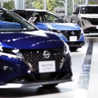 Nissan Motor Co. raised its forecast to operating profit of ¥180 billion from ¥150 billion for the fiscal year through March. | BLOOMBERG