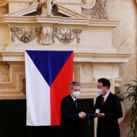 Czech Senate speaker Milos Vystrcil gives Taiwan Foreign Minister Joseph Wu the Silver Commemorative Medal of the Senate of the Parliament of the Czech Republic, in Prague on Oct. 27. | REUTERS