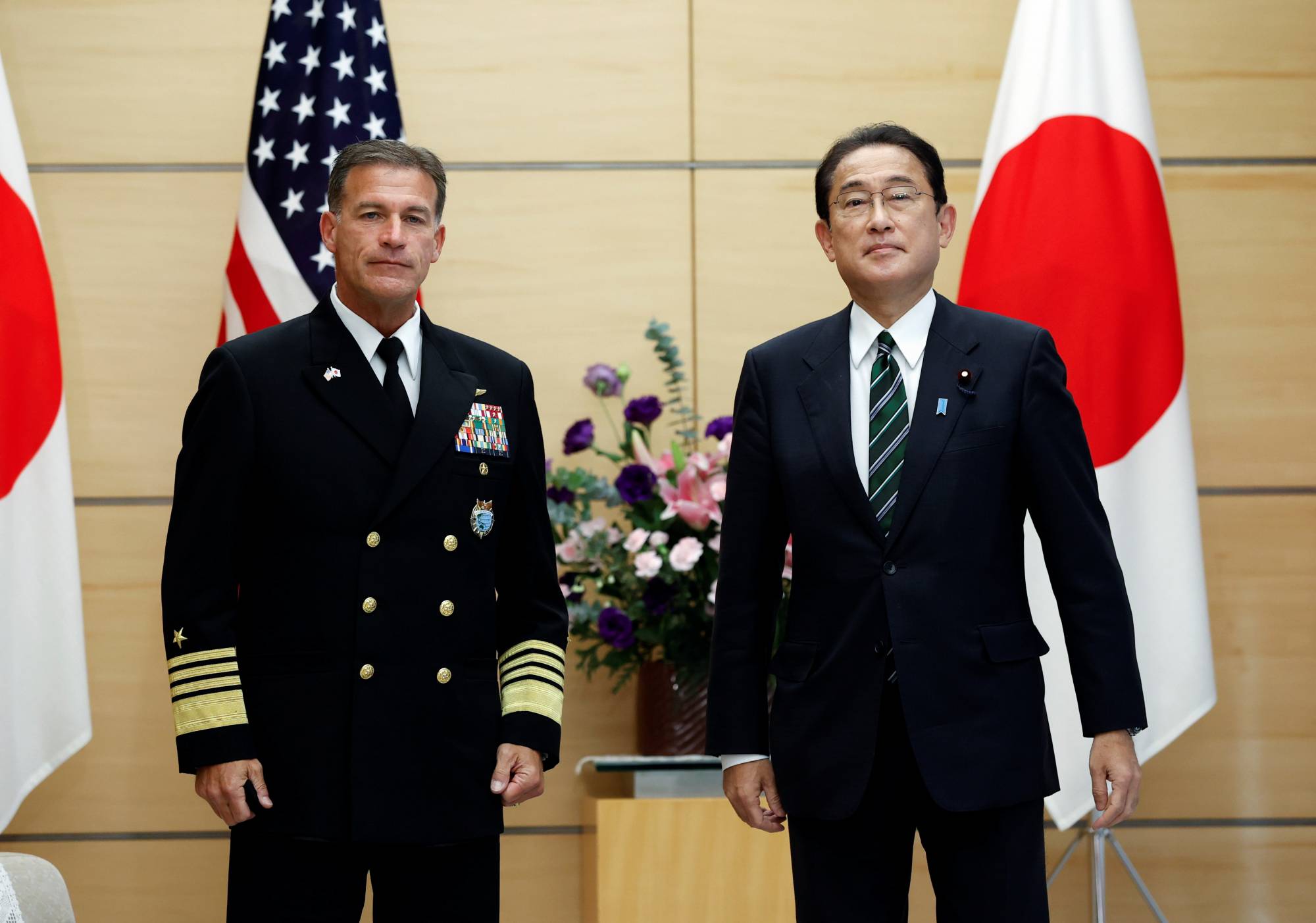 Prime Minister Fumio Kishida meets with Admiral John Aquilino, Commander of the United States Indo-Pacific Command, at the Prime Minister's Office in Tokyo on Thursday. | POOL / VIA REUTERS