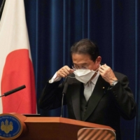 Prime Minister Fumio Kishida at a news conference in Tokyo on Wednesday | POOL / VIA REUTERS