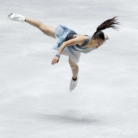 Kaori Sakamoto competes in the women\'s short program during the NHK Trophy at Yoyogi National Gymnasium on Friday. | REUTERS