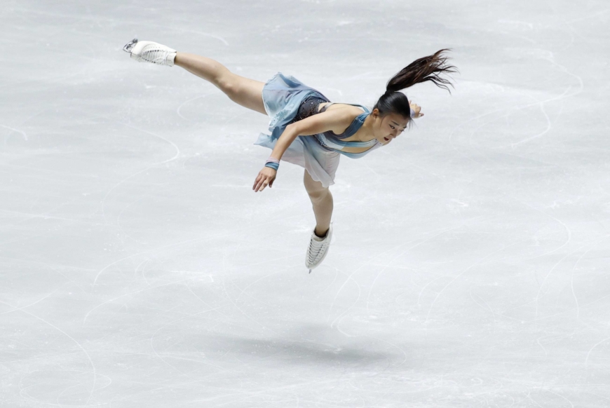 Kaori Sakamoto competes in the women's short program during the NHK Trophy at Yoyogi National Gymnasium on Friday. | REUTERS