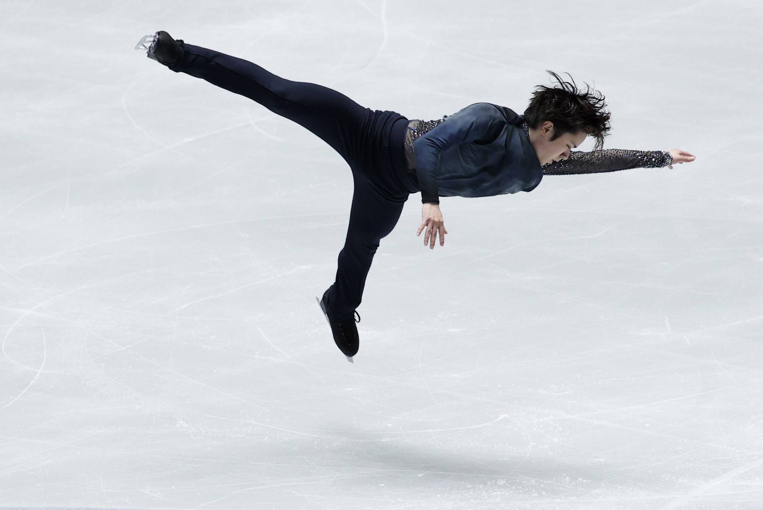 Shoma Uno skates during the men's short program of the NHK Trophy at Yoyogi National Gymnasium on Friday. | REUTERS