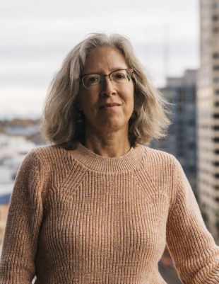 Nancy Paine, who started substitute teaching after she retired from teaching math, in Seattle on Nov. 2.  Because of staff shortages, some school districts are canceling classes. Others are lowering their hiring standards. The result can be a chaotic classroom. 'I think this is the year of the substitute,' she said. 'I think of us as the rescue squad, and we should be treated as the certified teachers we are.' | KYLE JOHNSON / THE NEW YORK TIMES