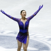 Kaori Sakamoto reacts after her free skate on Saturday. | REUTERS