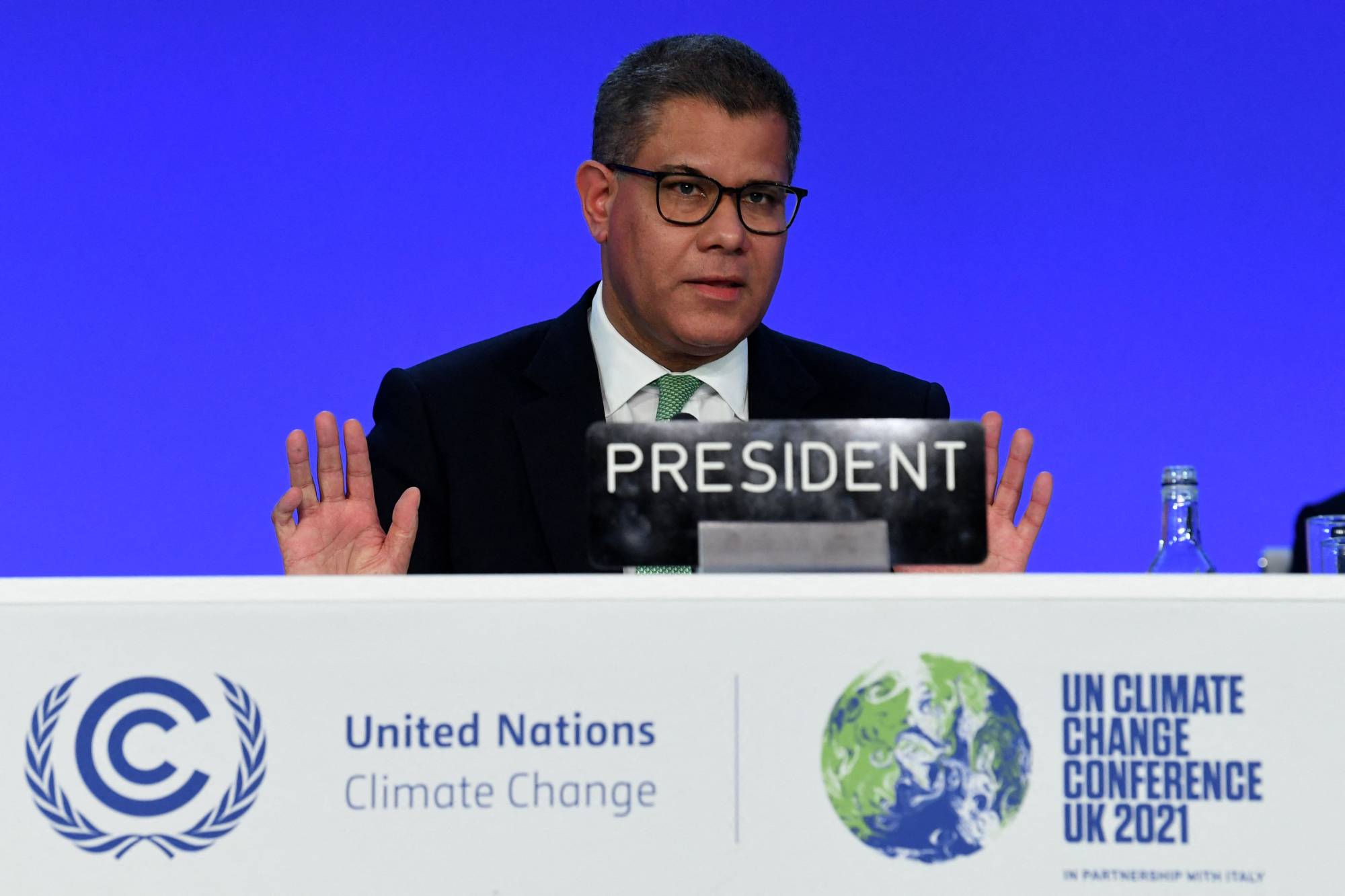 COP26 President Alok Sharma gestures during the final stages of the U.N. climate change conference in Glasgow, Scotland, on Saturday. | AFP-JIJI