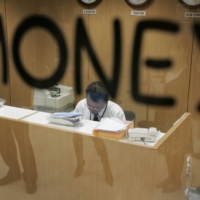Naoko Kuga, a senior researcher at the NLI Research Institute and an expert on consumer behavior, says weak purchasing power stemming from stagnant wages have seen corporations hesitant to raise prices. | REUTERS