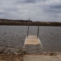 A floating dock on the Mississippi River near Goodhue County, Minnesota  | LAYLAH AMATULLAH BARRAYN/THE NEW YORK TIMES