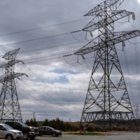 Power lines tower over Prairie Island Indian Community near Goodhue County, Minnesota | LAYLAH AMATULLAH BARRAYN/THE NEW YORK TIMES