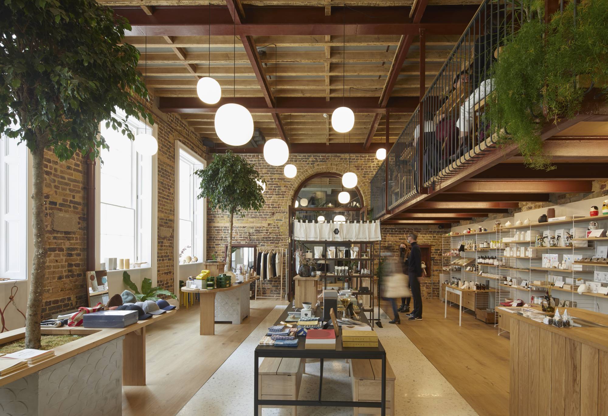 Cafe Kitsune’s mezzanine-level sitting area looks onto the retail space EDIT below. | EDMUND SUMNER