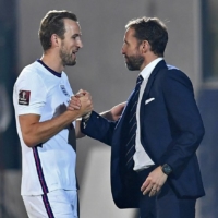 England\'s Harry Kane shakes hands with head coach Gareth Southgate after being substituted during Monday\'s World Cup qualifier against San Marino in Serravalle, San Marino. | REUTERS