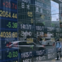 More Japanese companies have been offering share buybacks this fiscal year, while the Bank of Japan has reduced its purchases of exchange traded funds. | BLOOMBERG