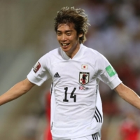 Japan midfielder Junya Ito celebrates his goal against Oman in Muscat on Tuesday. | AFP-JIJI
