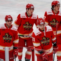 Players belonging to China\'s Kunlun Red Star react during a Kontinental Hockey League match against Amur Khabarovsk in Mytishchi, Russia, on Monday. | REUTERS