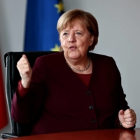 German Chancellor Angela Merkel is interviewed at the Chancellery in Berlin on Nov. 11. | REUTERS 