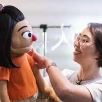 \"Sesame Street\" with introduce a new muppet named Ji-Young, a guitar-playing Korean American character who will bring rock music and conversations about racism to the children\'s program. | ZACH HYMAN / SESAME WORKSHOP / VIA THE NEW YORK TIMES
