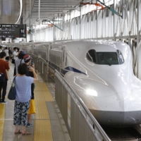 Children aged 6 to 11 will be allowed free rides on Nozomi super-express bullet trains from Nov. 24 to Dec. 19. | KYODO