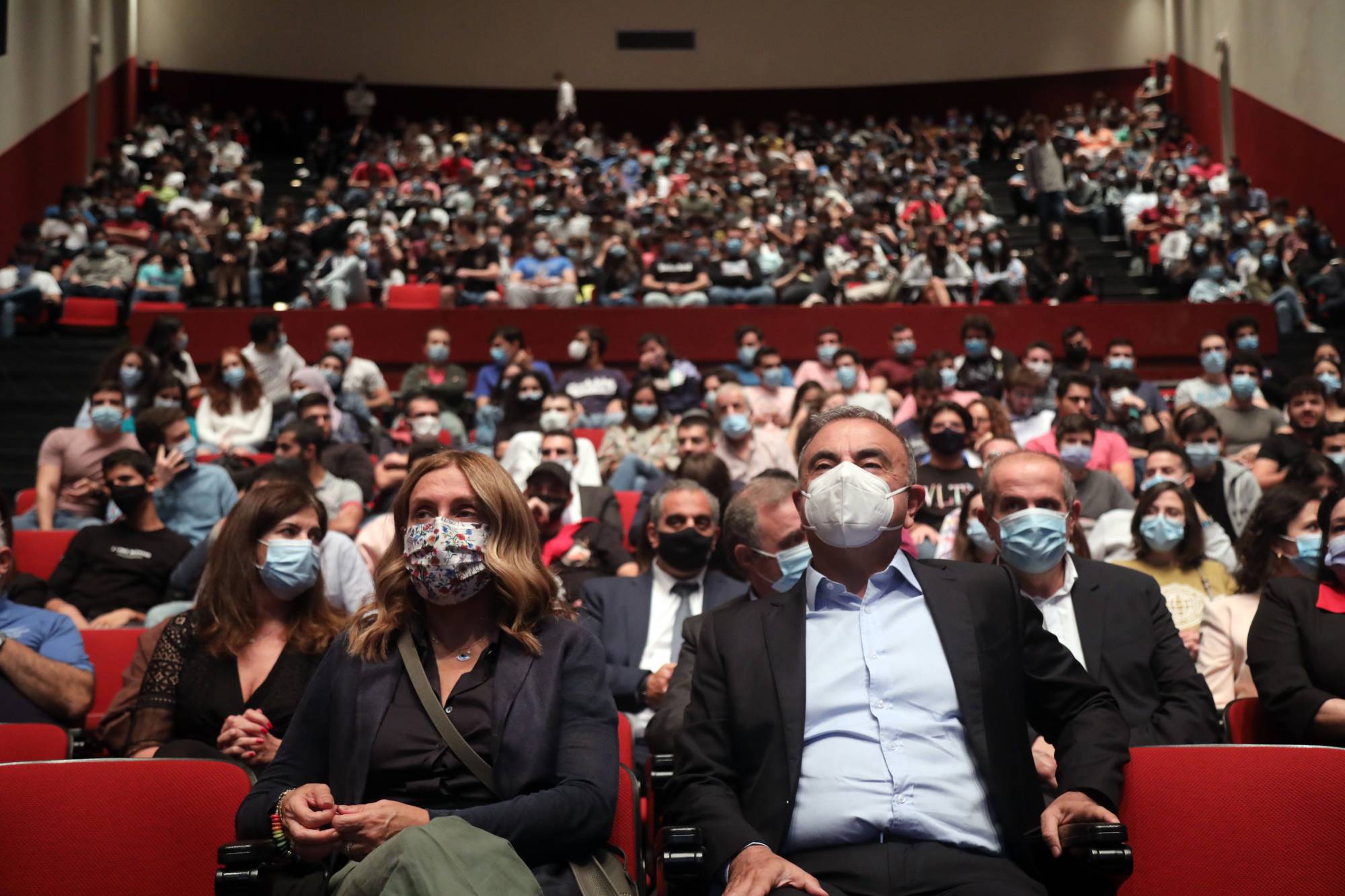 Former Nissan chief Carlos Ghosn and his wife, Carole, attend a roundtable event at St. Joseph University in Beirut on Oct. 28. | BLOOMBERG