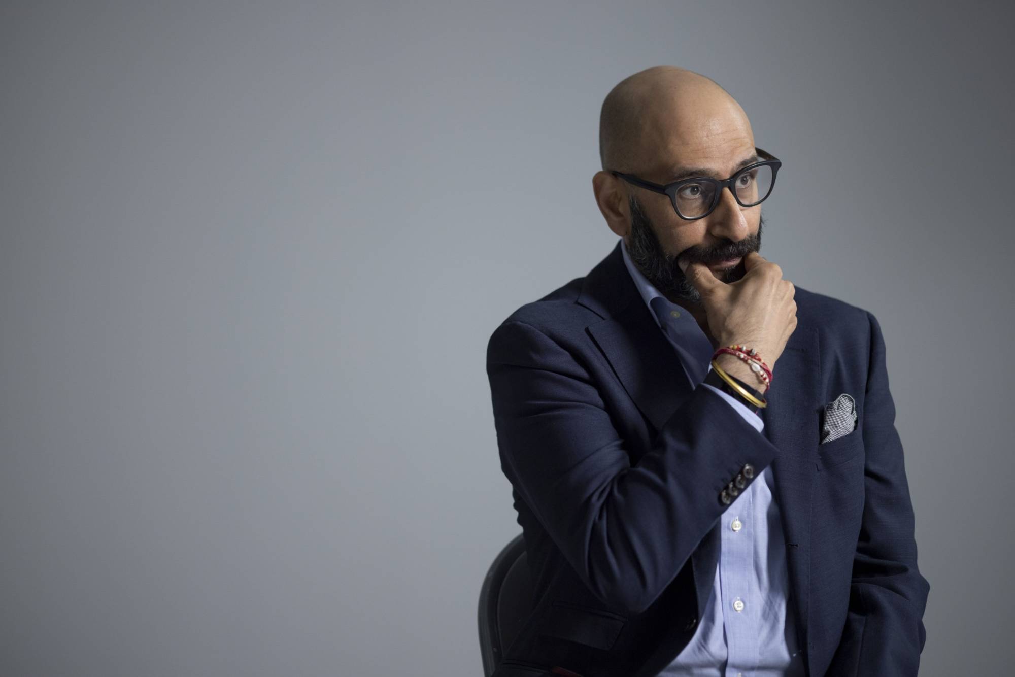 Ravinder Passi, former global general counsel at Nissan Motor Co., during an interview at a studio in London in March | BLOOMBERG