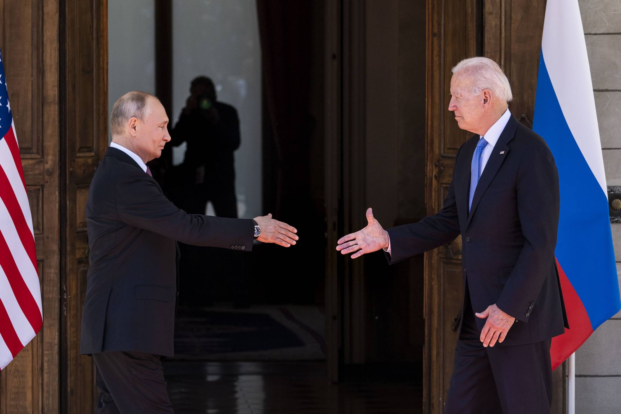 U.S. President Joe Biden greets Russian leader Vladimir Putin as they arrive for a meeting in Geneva in June. In the stretch of Europe from the Baltic Sea to the Black Sea, where Moscow and the West have competed for influence for decades, the threat of military conflict is growing.  | DOUG MILLS/THE NEW YORK TIMES