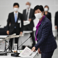 At the governors’ meeting Sunda, Yuriko Koike said the capital has made steadfast progress in getting its population vaccinated, noting that as of Thursday more than 80% of residents age 12 and older had already received their second shots. | RYUSEI TAKAHASHI
