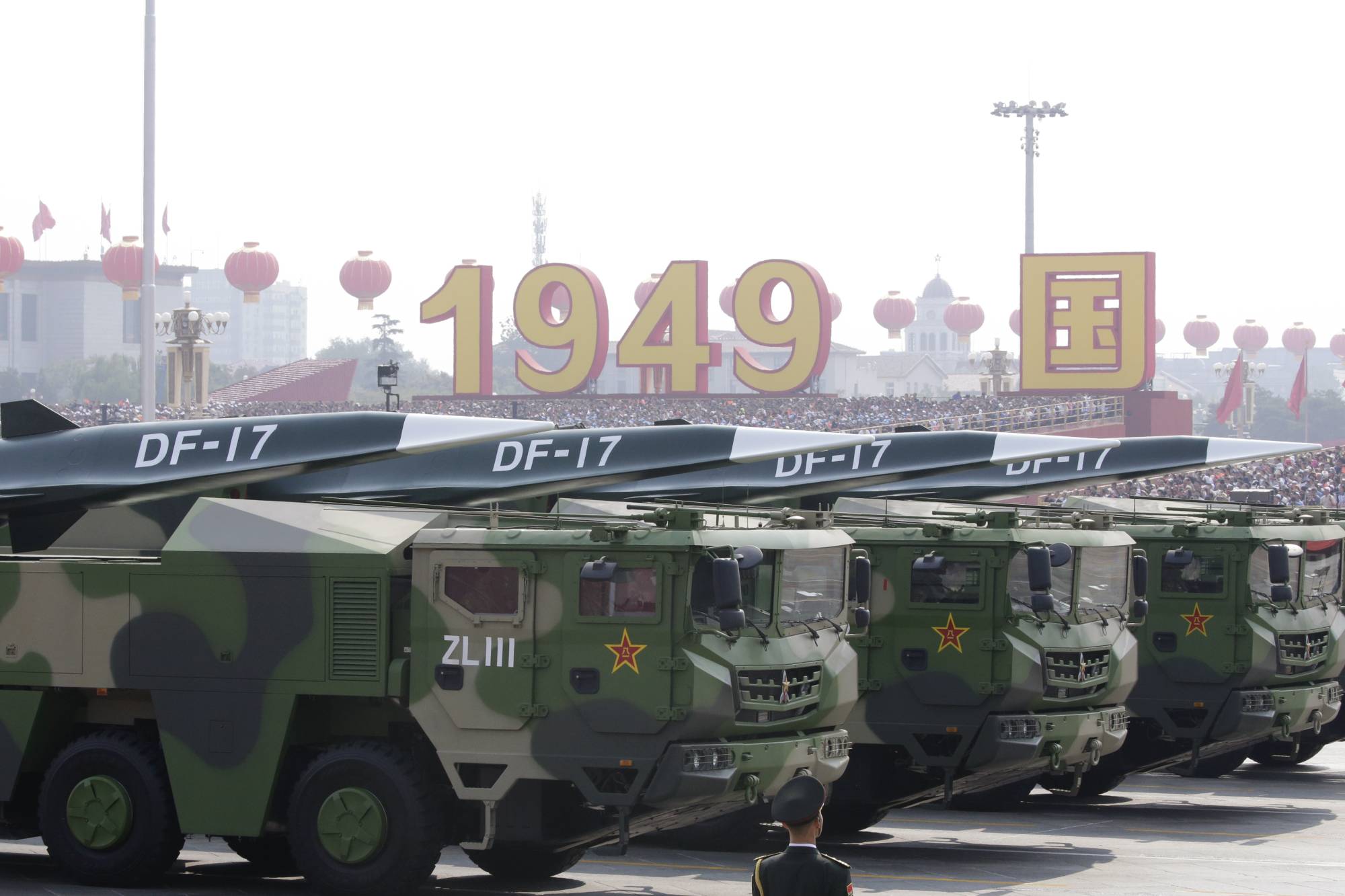 Chinese military vehicles carrying DF-17 hypersonic missiles travel past Beijing's Tiananmen Square during a military parade marking the 70th founding anniversary of the People's Republic of China, on Oct. 1, 2019.  | REUTERS