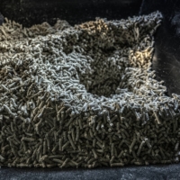 Fuel pellets made from shredded adult diapers in Houki, Tottori Prefecture, on Oct. 7. Turning used diapers into fuel pellets helps municipalities spend less money on waste management and reduces carbon emissions.  | JAMES WHITLOW DELANO/THE NEW YORK TIMES