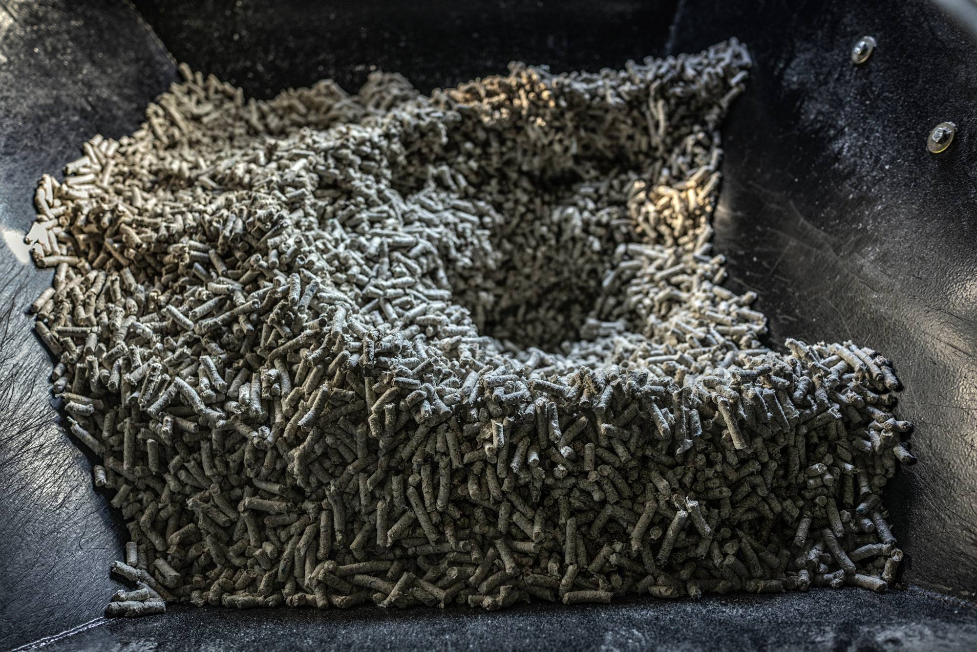Fuel pellets made from shredded adult diapers in Houki, Tottori Prefecture, on Oct. 7. Turning used diapers into fuel pellets helps municipalities spend less money on waste management and reduces carbon emissions. | James Whitlow Delano/The New York Times