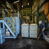 Shredded adult diapers at the recycling center in Houki, Tottori Prefecture, on Oct. 25. Turning used diapers into fuel pellets helps municipalities spend less money on waste management and reduces carbon emissions. | JAMES WHITLOW DELANO/THE NEW YORK TIMES