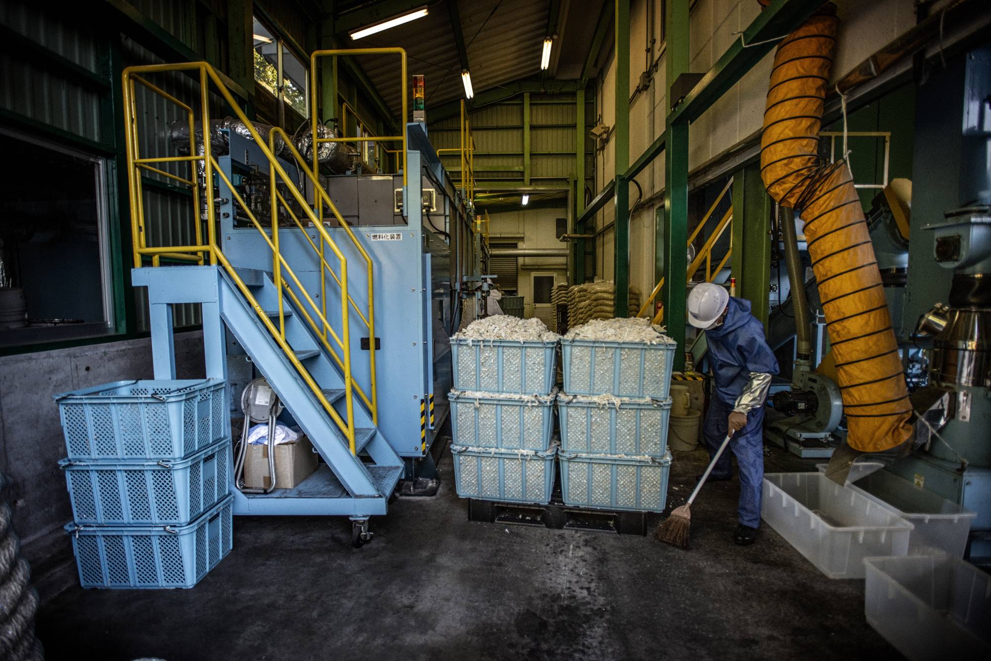 Shredded adult diapers at the recycling center in Houki, Tottori Prefecture, on Oct. 25. Turning used diapers into fuel pellets helps municipalities spend less money on waste management and reduces carbon emissions. | James Whitlow Delano/The New York Times
