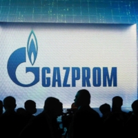 The Gazprom logo is displayed during the International Gas Forum at the Expoforum Convention and Exhibition Center in Saint Petersburg, Russia, last month. | AFP-JIJI