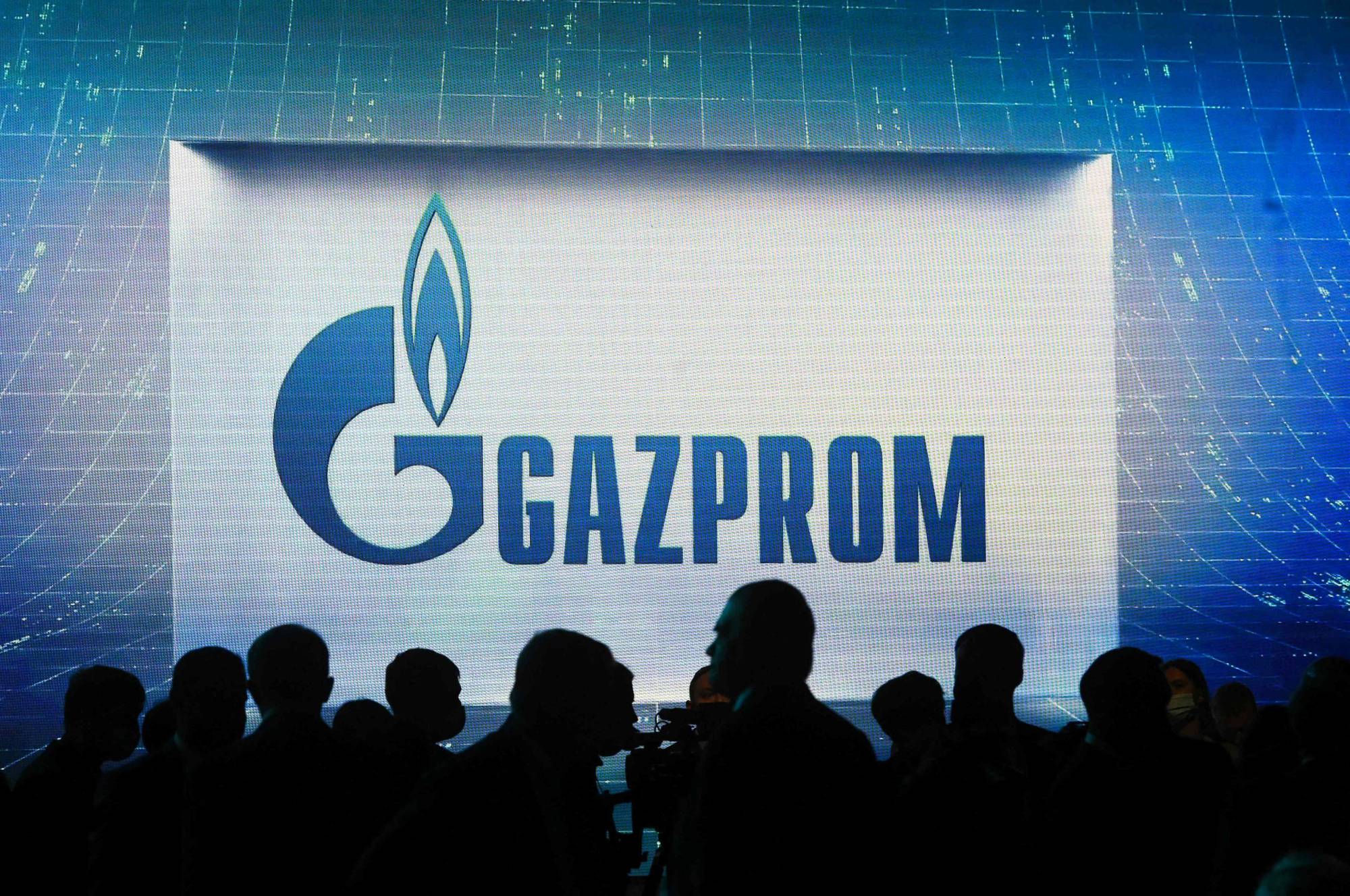 The Gazprom logo is displayed during the International Gas Forum at the Expoforum Convention and Exhibition Center in Saint Petersburg, Russia, last month. | AFP-JIJI