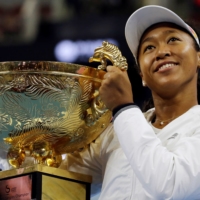 Naomi Osaka celebrates after winning the China Open in October 2019.  | REUTERS