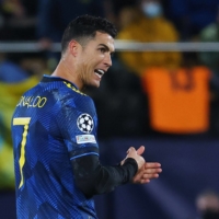 Manchester United\'s Cristiano Ronaldo celebrates after scoring a goal during a Champions League group match against Villarreal CF on Tuesday.  | AFP-JIJI