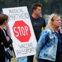 Protesters in The Hague demonstrate in September against the Dutch authorities introduction of a mandatory \"corona pass\" showing a person has tested negative for the virus. The pass was needed to enter bars, restaurants and other cultural events.  | REUTERS