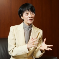 Junko Nakagawa, the Bank of Japan\'s newest board member, speaks during an interview at the central bank\'s headquarters in Tokyo on Wednesday. | BLOOMBERG