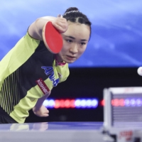 Mima Ito returns the ball against Wang Yidi during their women\'s singles quarterfinal at the table tennis world championships in Houston on Saturday. | USA TODAY / VIA REUTERS