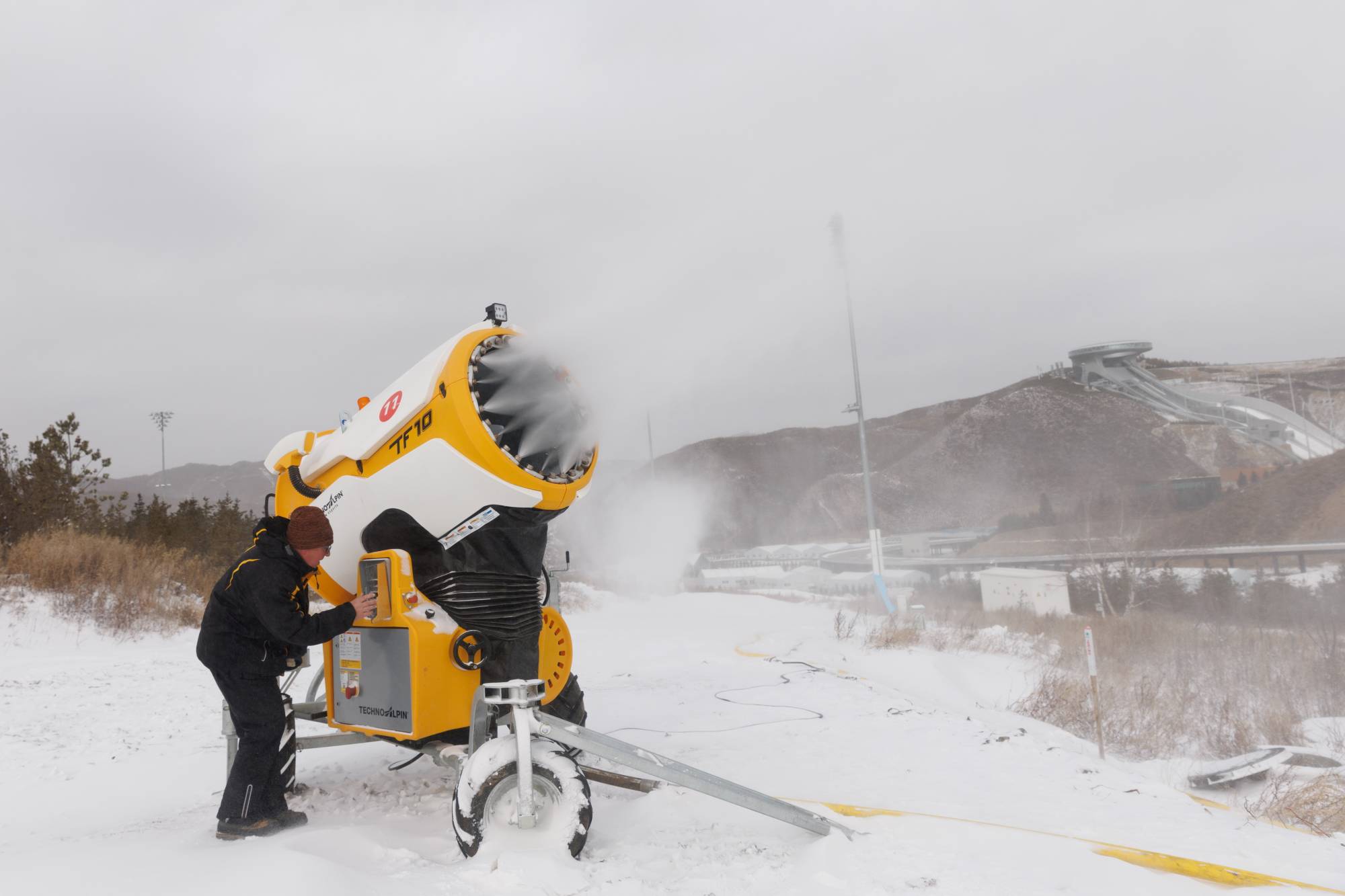 Making the snow stick: Wind challenges Winter Games slope makers - The  Japan Times