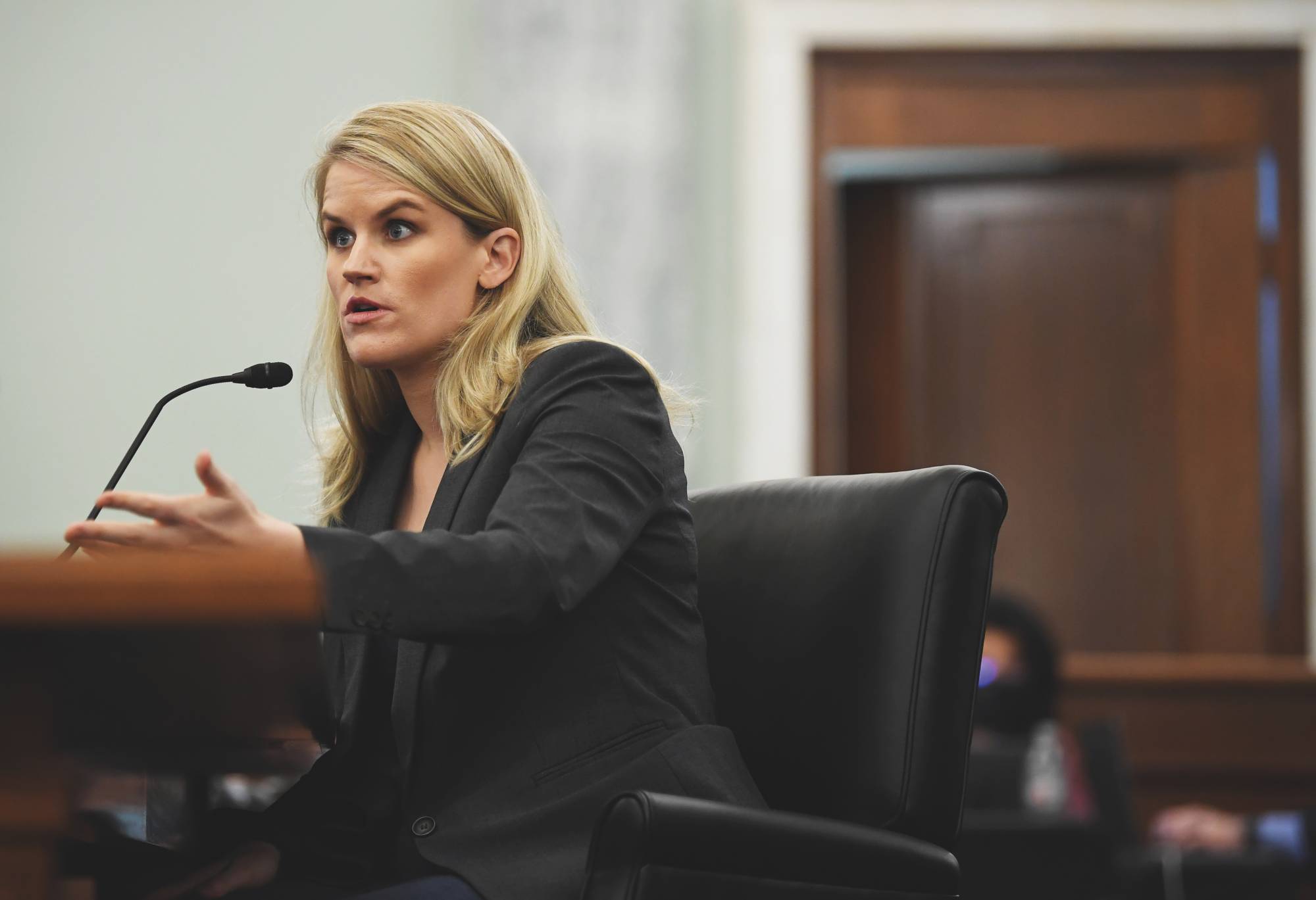 Facebook whistleblower Frances Haugen appears at a Senate hearing in Washington in October 2021. | Matt McClain / Pool / Getty Images