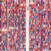 An aerial view of shipping containers sitting stacked at the world\'s biggest automated container terminal in Shanghai, China, in May 2021. | VCG / VCG / VIA GETTY IMAGES