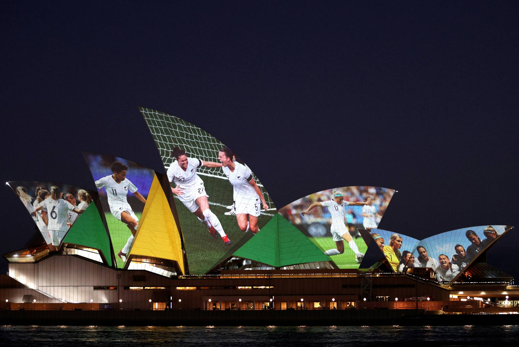 The Sydney Opera House lights up on June 25, 2020, in celebration of Australia and New Zealand's joint bid to host the 2023 Women's World Cup. | REUTERS
