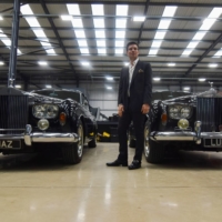 David Lorenz, founder of Lunaz, which converts classic combustion engine cars to electric, next to two converted Rolls Royce models in Silverstone, England, on Nov. 17. | REUTERS