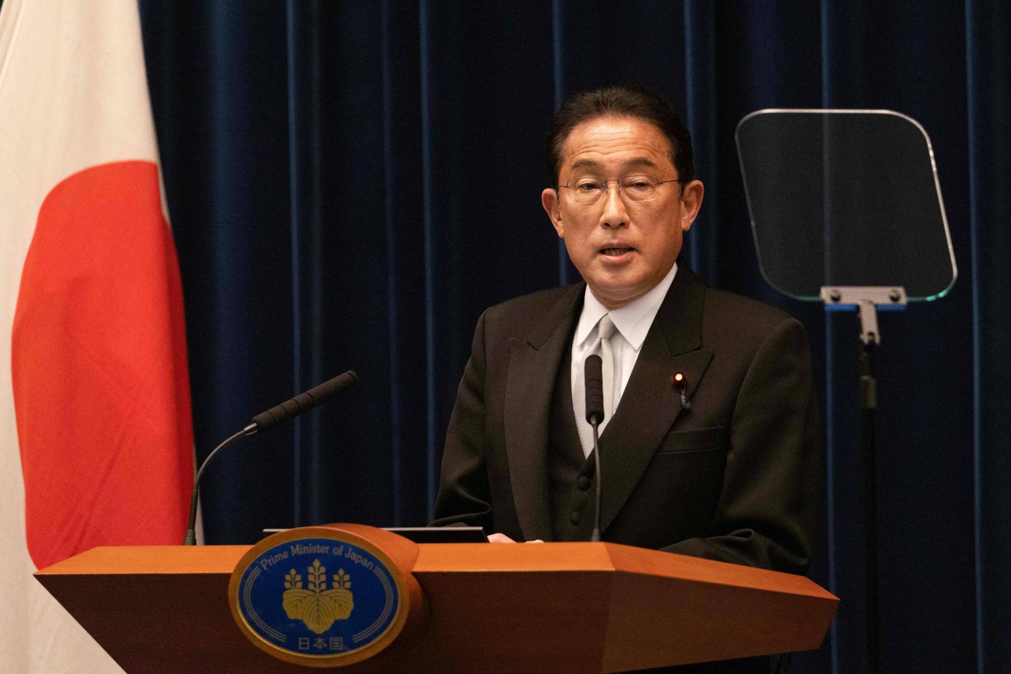 Prime Minister Fumio Kishida speaks during a news conference at the Prime Minister's Office in Tokyo last month. | POOL / VIA AFP-JIJI