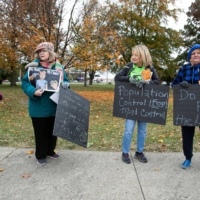 Protesters gather outside a school being used as a vaccination site in Louisville, Kentucky in November.
 | REUTERS
