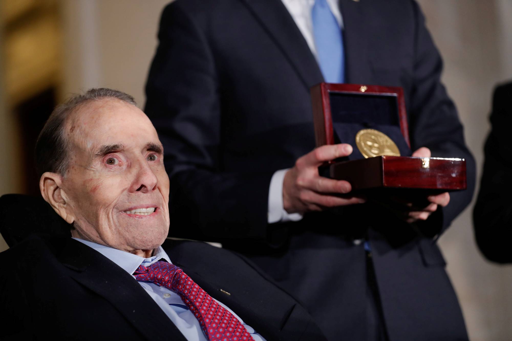 Dole is presented a Congressional Gold Medal during a ceremony held in his honor in Washington in 2018. | REUTERS