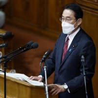 Prime Minister Fumio Kishida delivers a policy speech during an extraordinary session of parliament in Tokyo on Monday. | BLOOMBERG