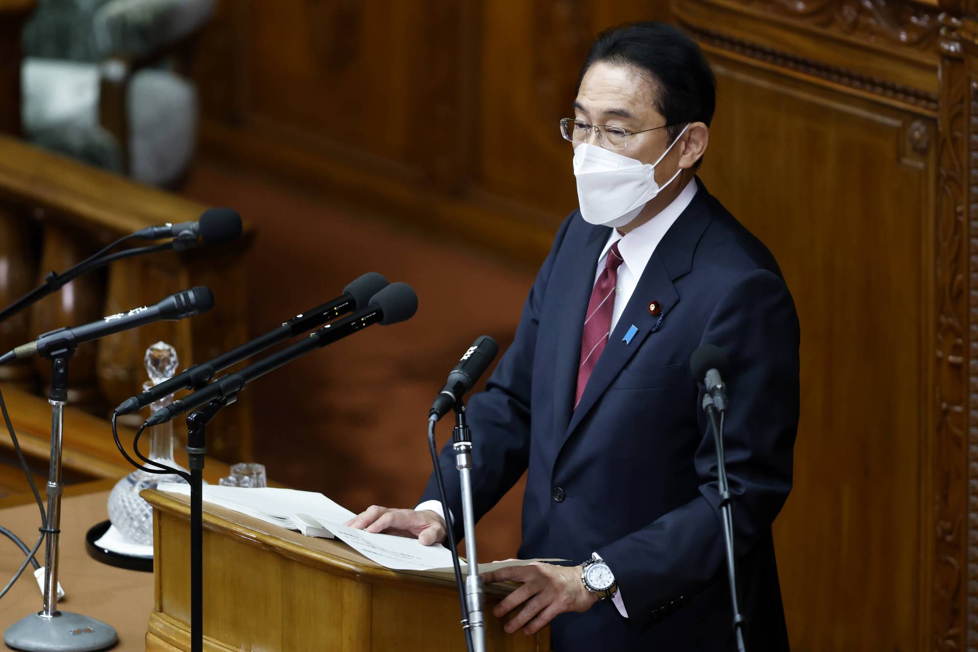 Prime Minister Fumio Kishida delivers a policy speech during an extraordinary session of parliament in Tokyo on Monday. | BLOOMBERG
