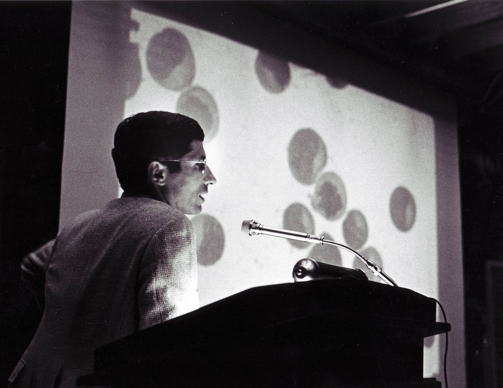 An undated photo shows Dr. Anthony Fauci speaking in 1985. Fauci, who oversaw the development of combination therapy for HIV, says researchers will be able to quickly test combinations of pills to treat COVID-19 in clinical trials. | NIAID / via The New York Times