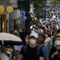 Japan\'s economy in the July-September period shrank an annualized real 3.6% from the previous quarter, downgraded from the 3.0% contraction initially reported. | BLOOMBERG
